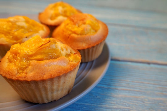 On,A,Gray,Plate,On,A,Blue,Wooden,Table,Are