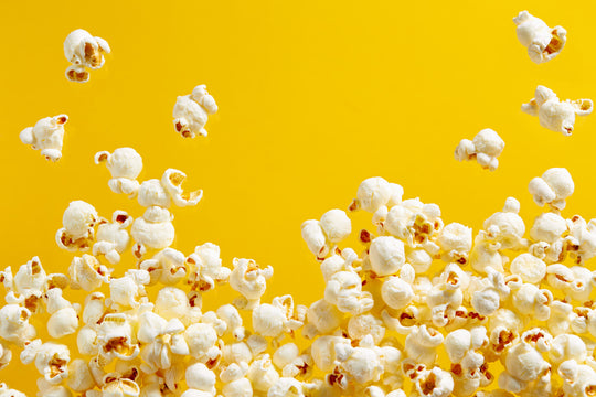 Close-up,Of,Popcorn,Against,Yellow,Background