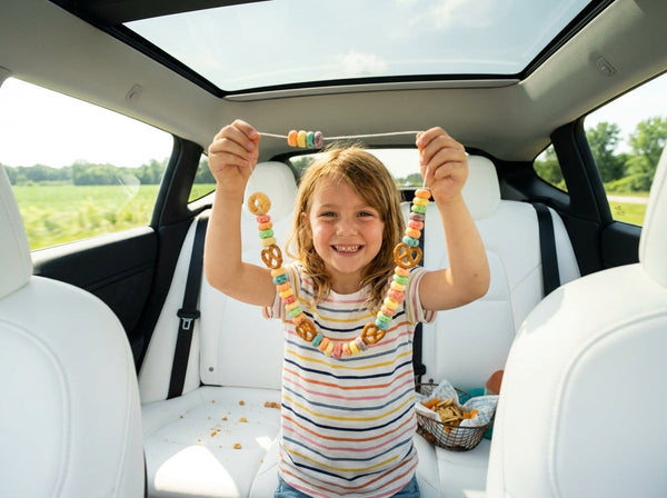 A happy child wearing a DIY edible food necklace in the backseat during a family road trip.