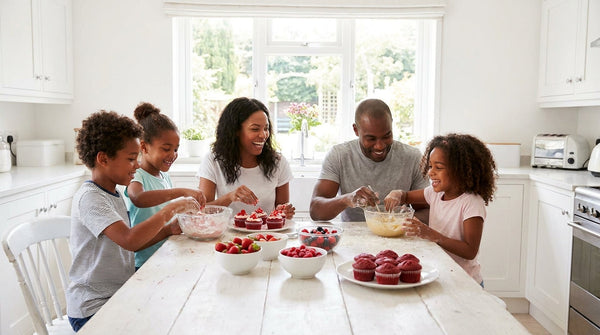 A family celebrating Junenteeth with baking and decorating 