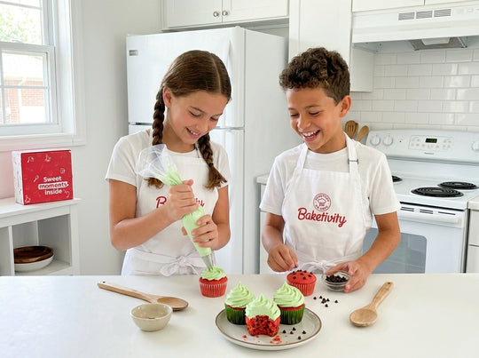 Kids baking and decorating watermelon cupcakes 