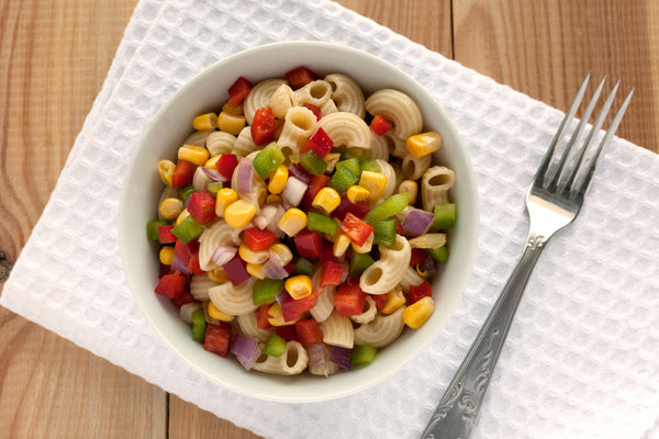 Macaroni,,Peppers,,Corn,Grain,Salad,Bowlon,A,White,Napkin.