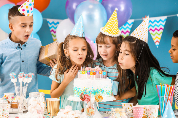 Little,Children,Celebrating,Birthday,At,Home