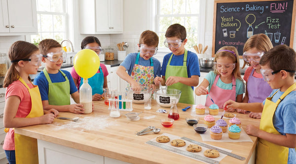 Kids having fun baking together while exploring simple STEM science experiments in a bright kitchen