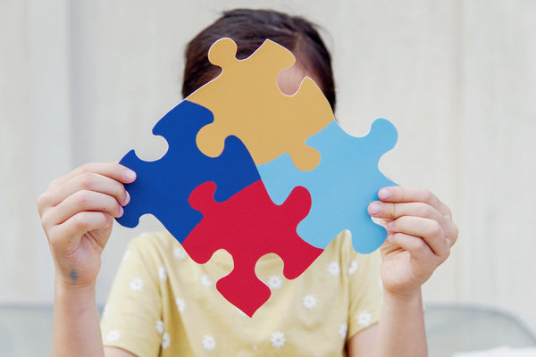 Kid,Girl,Hands,Holding,Puzzle,Jigsaw,,Mental,Health,Concept,,Autism
