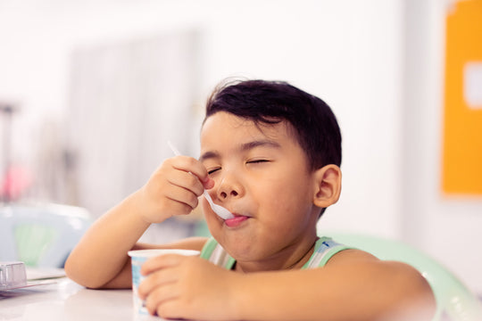 Tasty,Food,And,Delicious,Food,Concept.portrait,Asian,Boy,With,Spoon