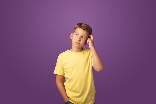 Thoughtful,Preteen,Kid,Boy,Standing,With,Puzzled,Serious,Expression,,Making